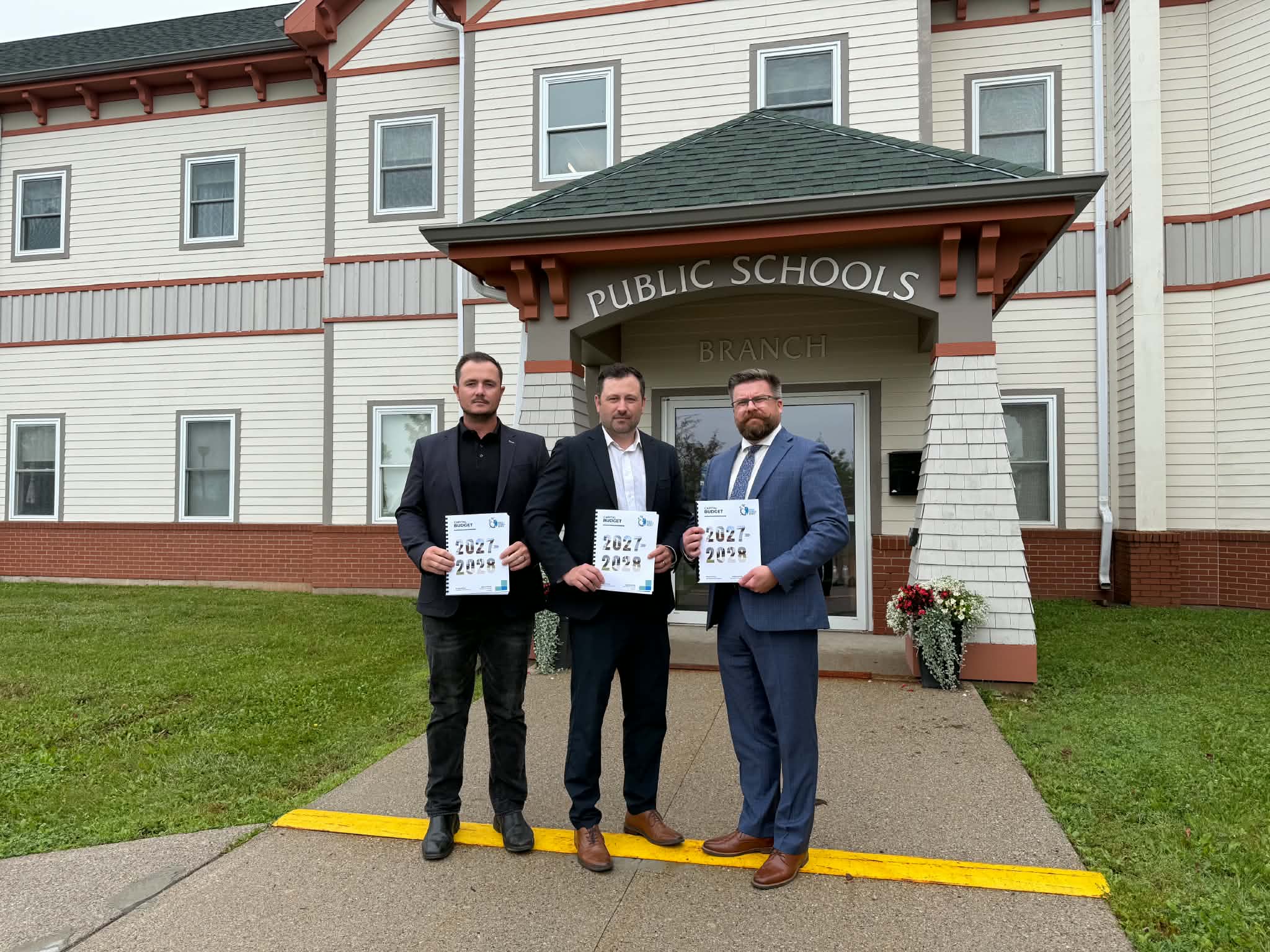 From left to right, Peter MacLeod, PSB Director of Property Services, Rob MacAdam, Acting Director of the Public Schools Branch, Andrew MacFarlane, Chair of the Public Schools Branch Board of Trustees